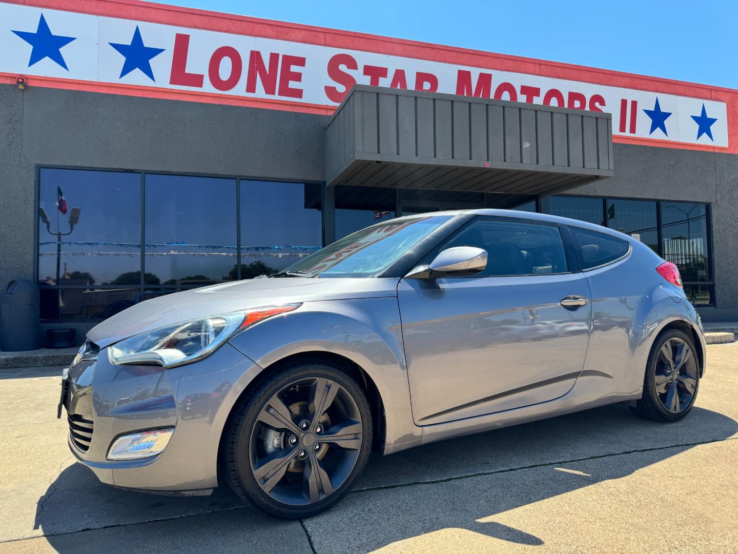 2016 GRAY /Black HYUNDAI VELOSTER Base 3dr Coupe (KMHTC6AD2GU) with an 1.6L I4 engine, Automatic 6-Speed transmission, located at 5900 E. Lancaster Ave., Fort Worth, TX, 76112, (817) 457-5456, 0.000000, 0.000000 - This is a 2016 HYUNDAI VELOSTER 4 DR SEDAN that is in excellent condition. The interior is clean with no rips or tears or stains. All power windows, door locks and seats. Ice cold AC for those hot Texas summer days. It is equipped with a CD player, AM/FM radio, AUX port, Bluetooth connectivity and S - Photo#0